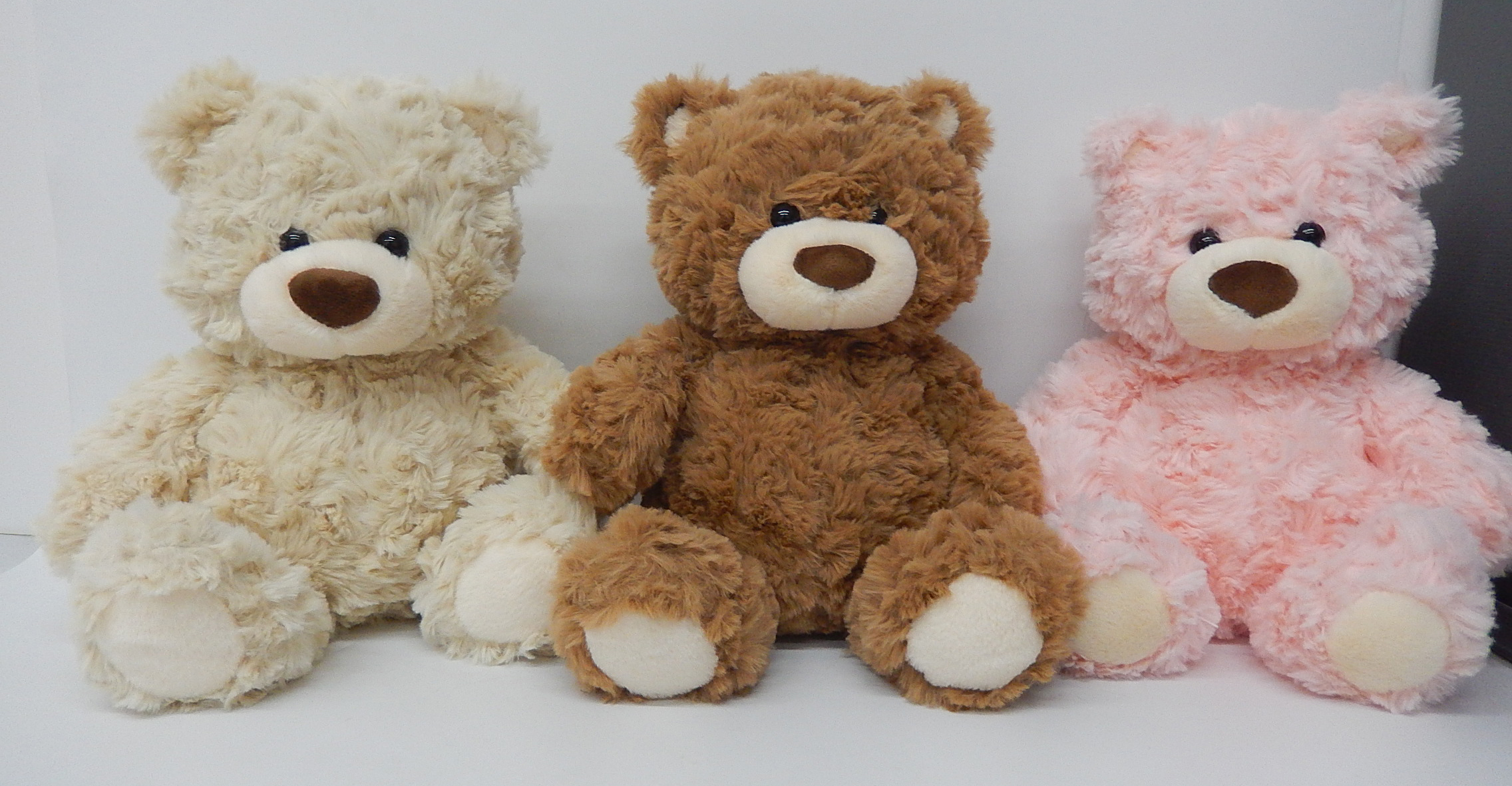 розовый плюшевый мишка