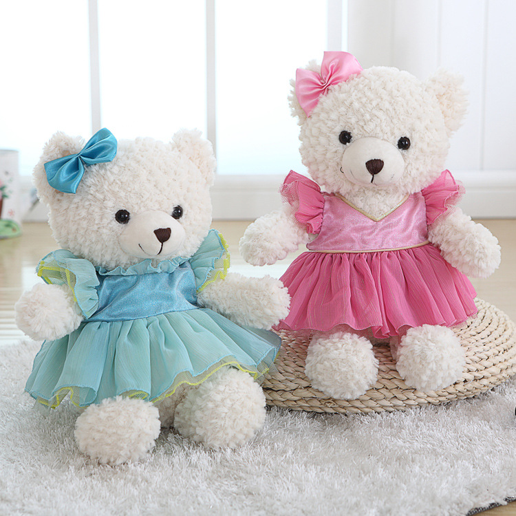 белый плюшевый мишка